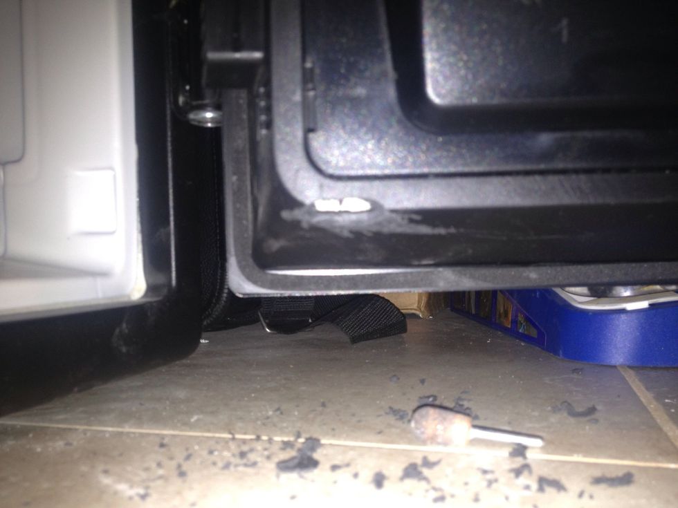 I used my dremel to notch the space, from the head of the bold, eventually getting enough gone to close with ease