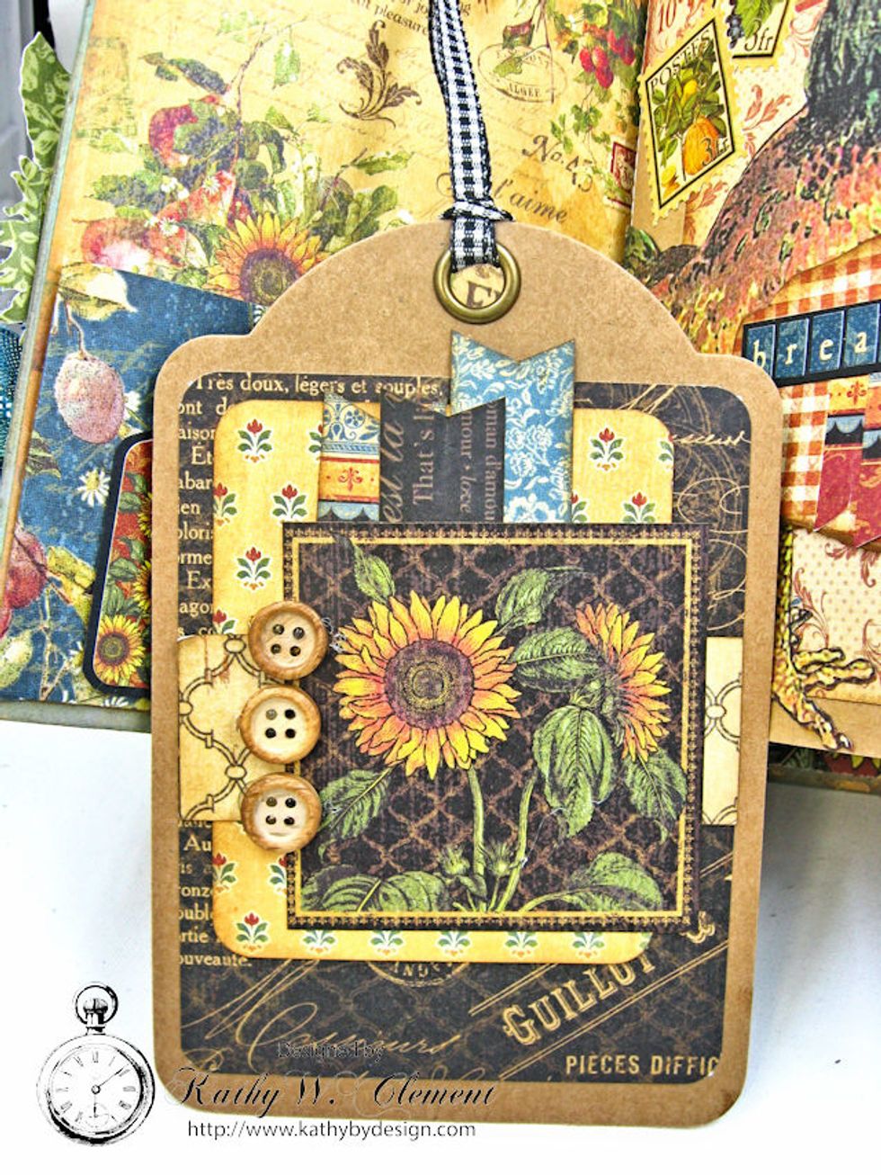I used paper scraps to decorate Staples tags for the pockets. The back of each tag has a small folio for photos.