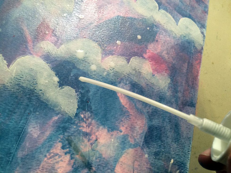 I used Pearl Fairy Dust to sprinkle dots on my page.  I wanted bigger droplets so I took out the spray nozzle and dripped the Pearl Fairy Dust around the page.