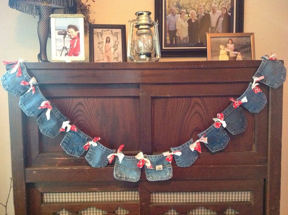 I used pinking shears to cut strips of material to tie in between each pocket. These could be very inexpensive projects using jeans you already own. Happy Crafting!