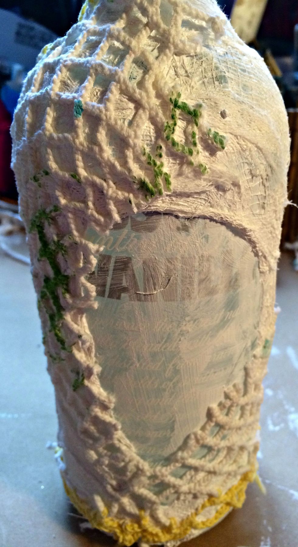 I used the doily to frame the opposite tops and bottom of the open area because I knew I would be applying my embellishments to these areas as well. Let this dry thoroughly overnight.