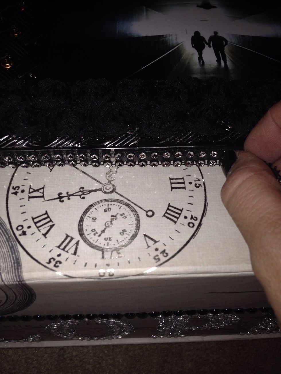 I used the rhinestone ribbon to outline the box