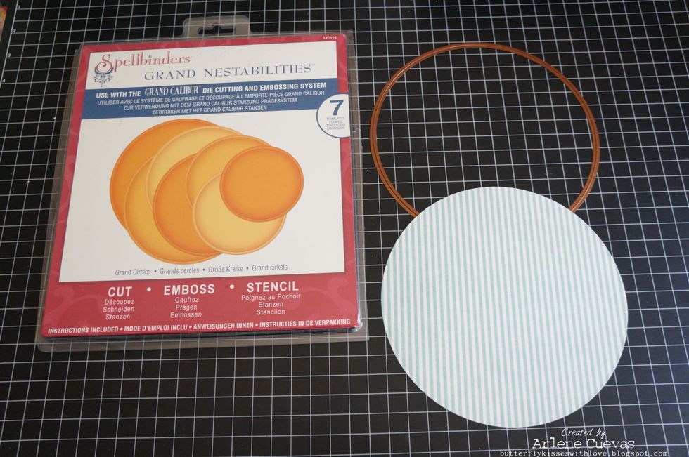 I used the Spellbinders Grand Nestabilities Circles die (and Grand Calibur die-cutting machine) to cut out a large circle with design paper...