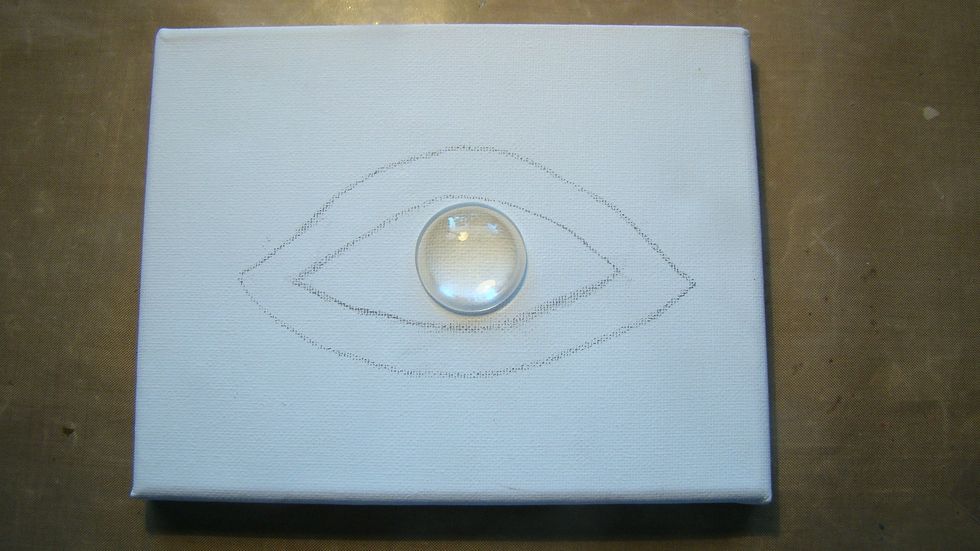 I used this acrylic piece that will be the eyeball and then I traced the eye around it.