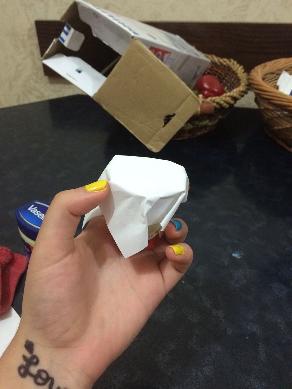 I used this paper to cover it as a lid