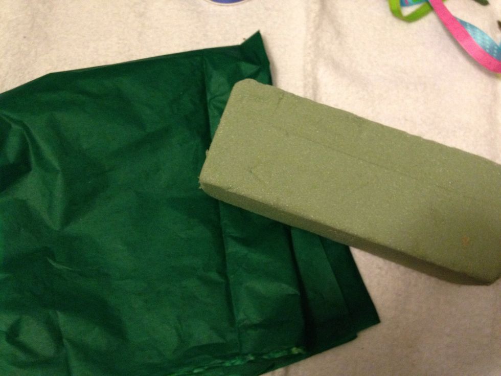 I used tissue paper to line the container but you can use a foam block