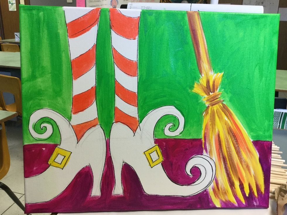 I used two shades of purple for the ground. I used the lighter purple behind the boots for added contrast.