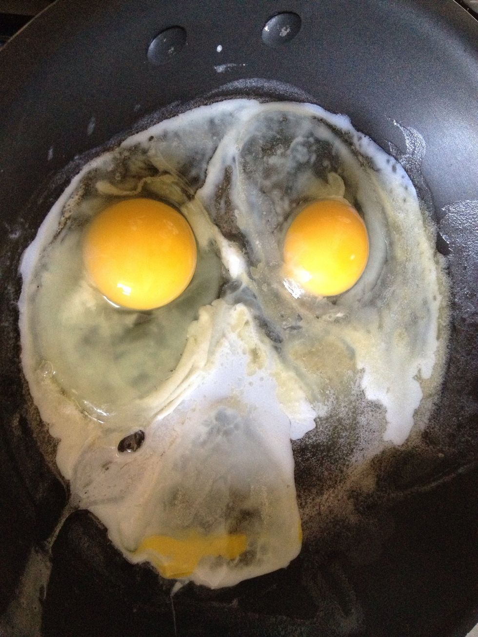 I usually break my eggs on the side of the pan or I use an object like a spoon to crack them. If you're worried about breaking the eggs or shells you can do it in a bowl or cup first.