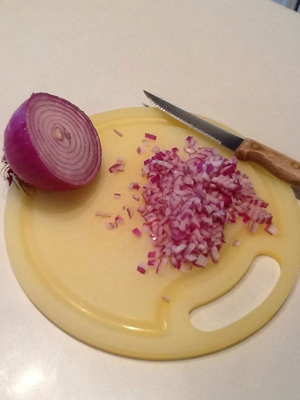 I usually dice half of a red onion, then use half of this amount for the bruschetta. The other half I store in a tightly zipped plastic bag for salads or other recipes.