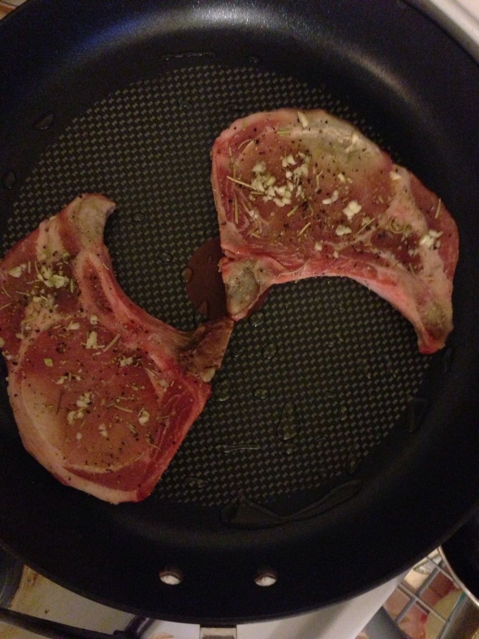 I usually don't use oil but I did today. 1 teaspoon is enough. Let the oil heat up and place your chops on the pan. Cook for about 7 minutes on each side, turning a few times in between.