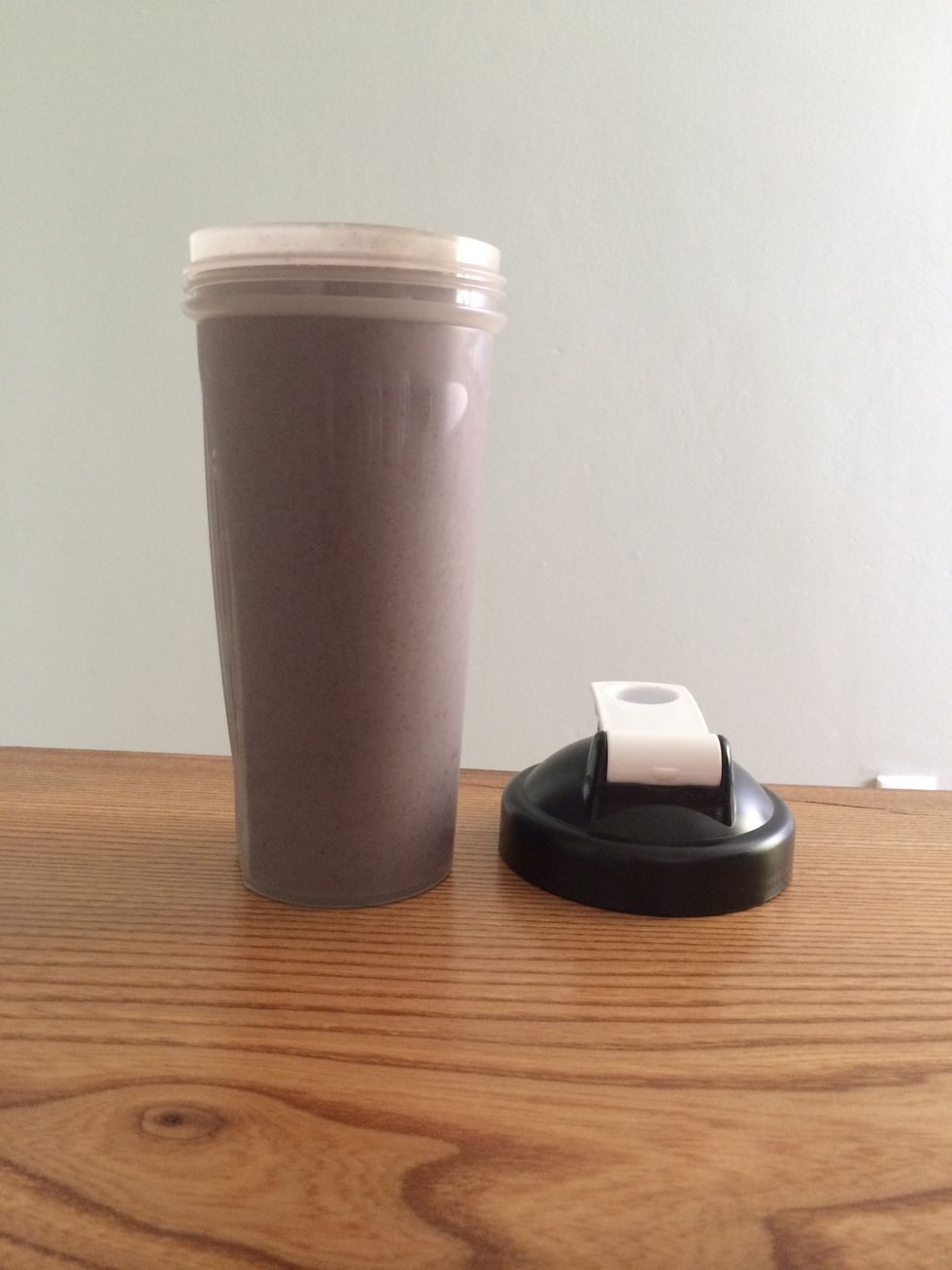 I usually drink a smoothie on the way to the gym in the morning. This is my to go container: a blender bottle with the whisking ball removed.