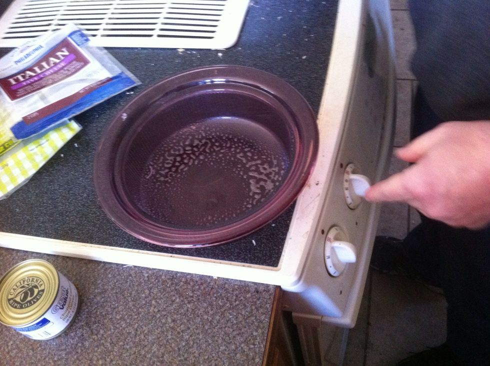 I've always only used a glass casserole dish, so I'm not sure if a metal one would work.  Spray just a "little" bit of canned spray in the glass dish \u27a1