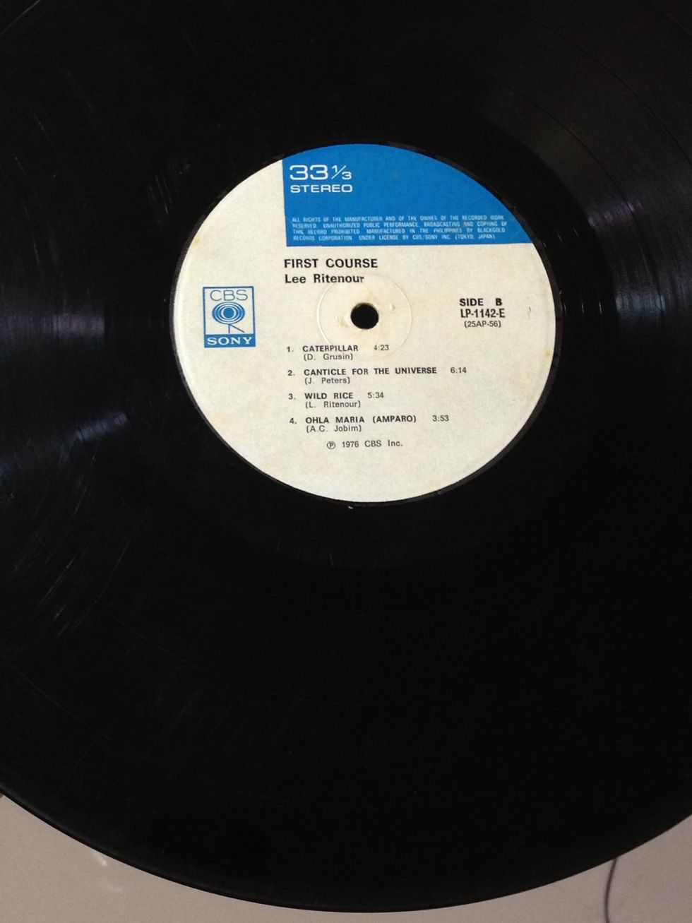 I've chosen my Lee Ritenour's First Course album. I picked this one up used.. Unfortunately, the record was very worn out. TIP: it would help if you could find an LP with a colorful record label.