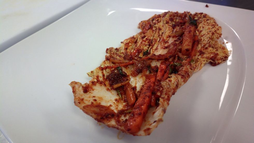 I've done mine on a plate so you can see more clearly. You can do it directly into the container. Fill Each leaf of cabbage with the vitamin enriched filling and layer them on top of each other.