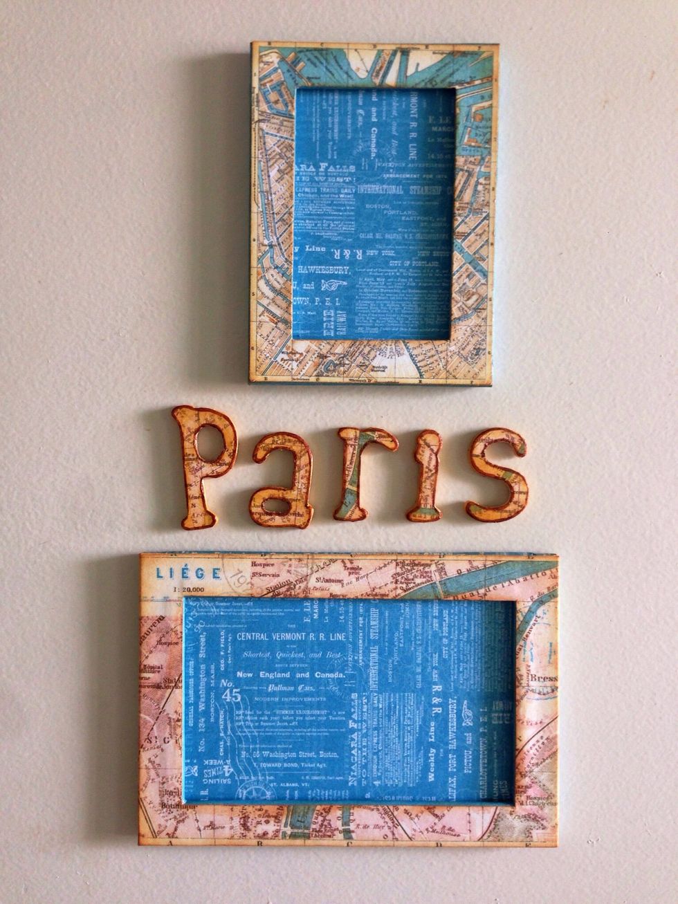 I've used another map ephemera to create one more frame... Here showing 2 travel map frames and the word "Paris" on my steel door...