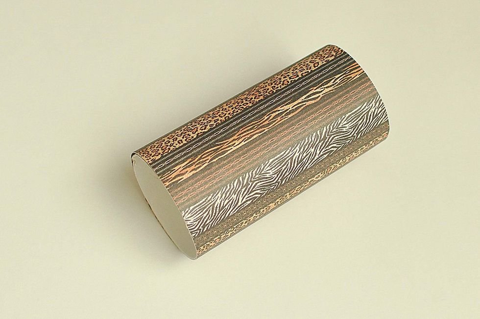 I've wrapped it with paper Safari Adventure collectin by Graphic 45