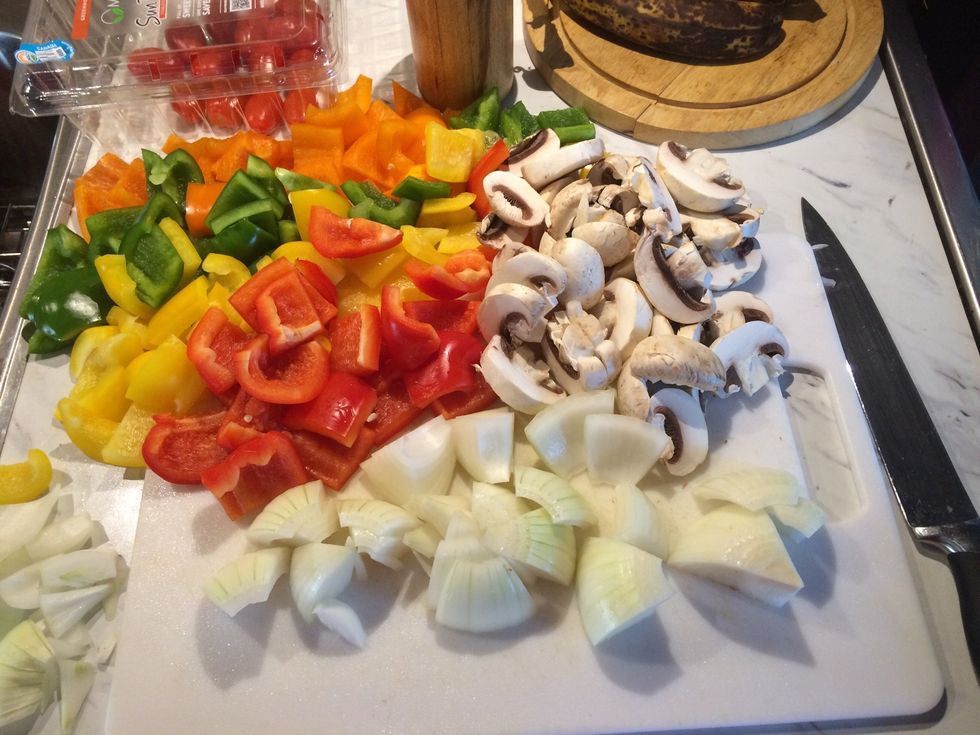 I waited a bit before I started chopping up the vegetables. Chop them up about the same size as the chicken. I did mine quickly so they look sloppy!