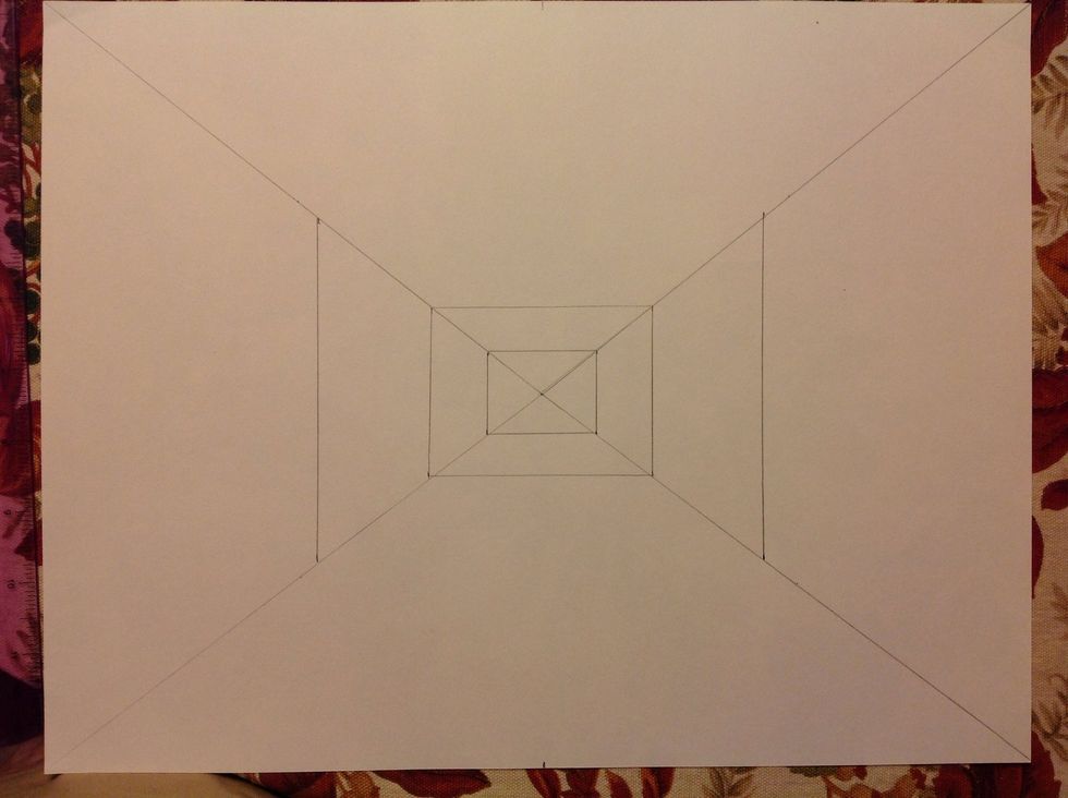 I want to draw the main intersection of the hallway. From the center point measure out to 4 inches. Draw a vertical line to connect the 2 marks on the left and right sides of the rectangle.