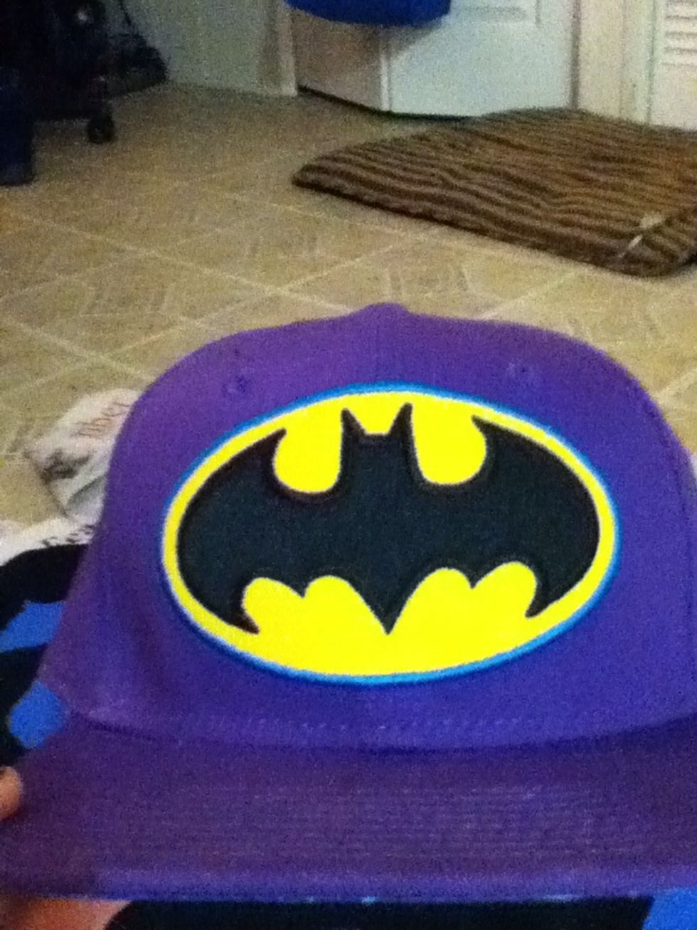 I want to have a batman symbol on my shirt so I'm using my hat as a reference