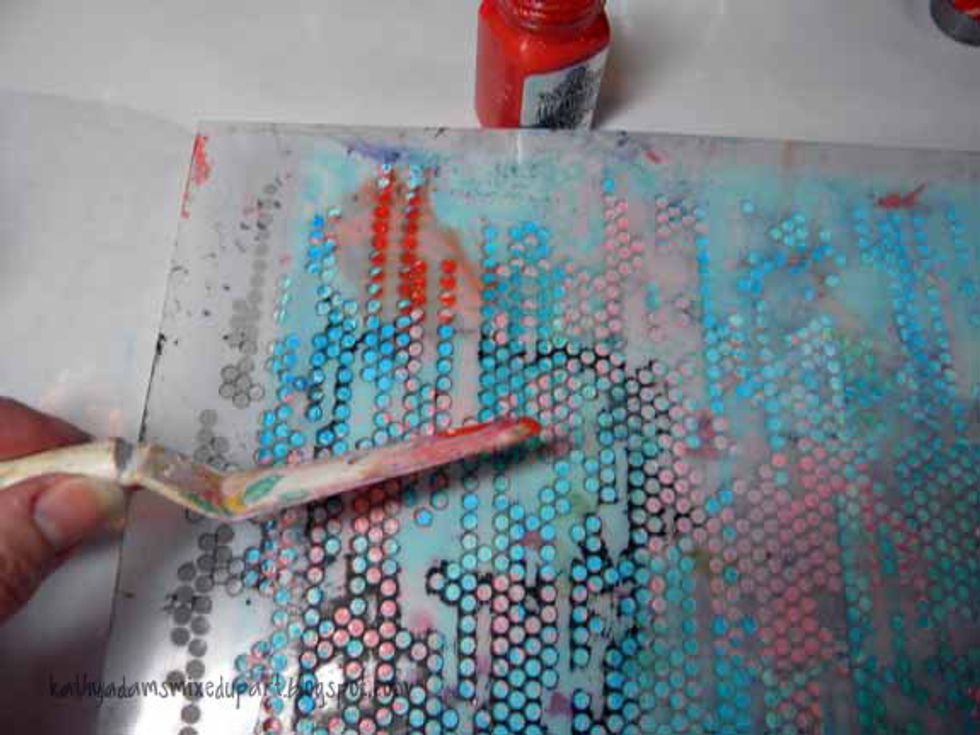 I wanted more vibrant color, so I swiped the Coral Sorbet, right from the bottle, through the stencil randomly on top of the pastel pink dots and let that dry.