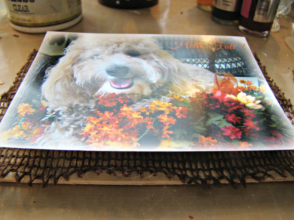 I wanted my photo to be dimensional on the top of the burlap backing so I added pieces of 3 pieces of cardboard to the back of the photo and adhered to the matting.