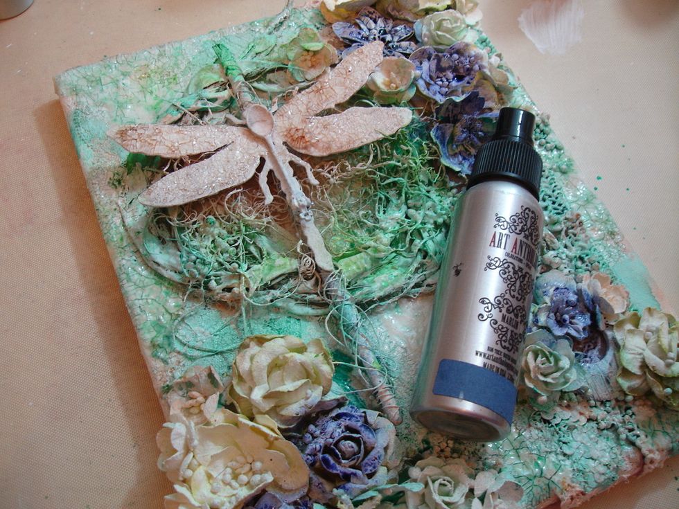 I wanted pops of color so I sprayed Marlin Colorations to some of the flowers, heat dried it with my heat tool.