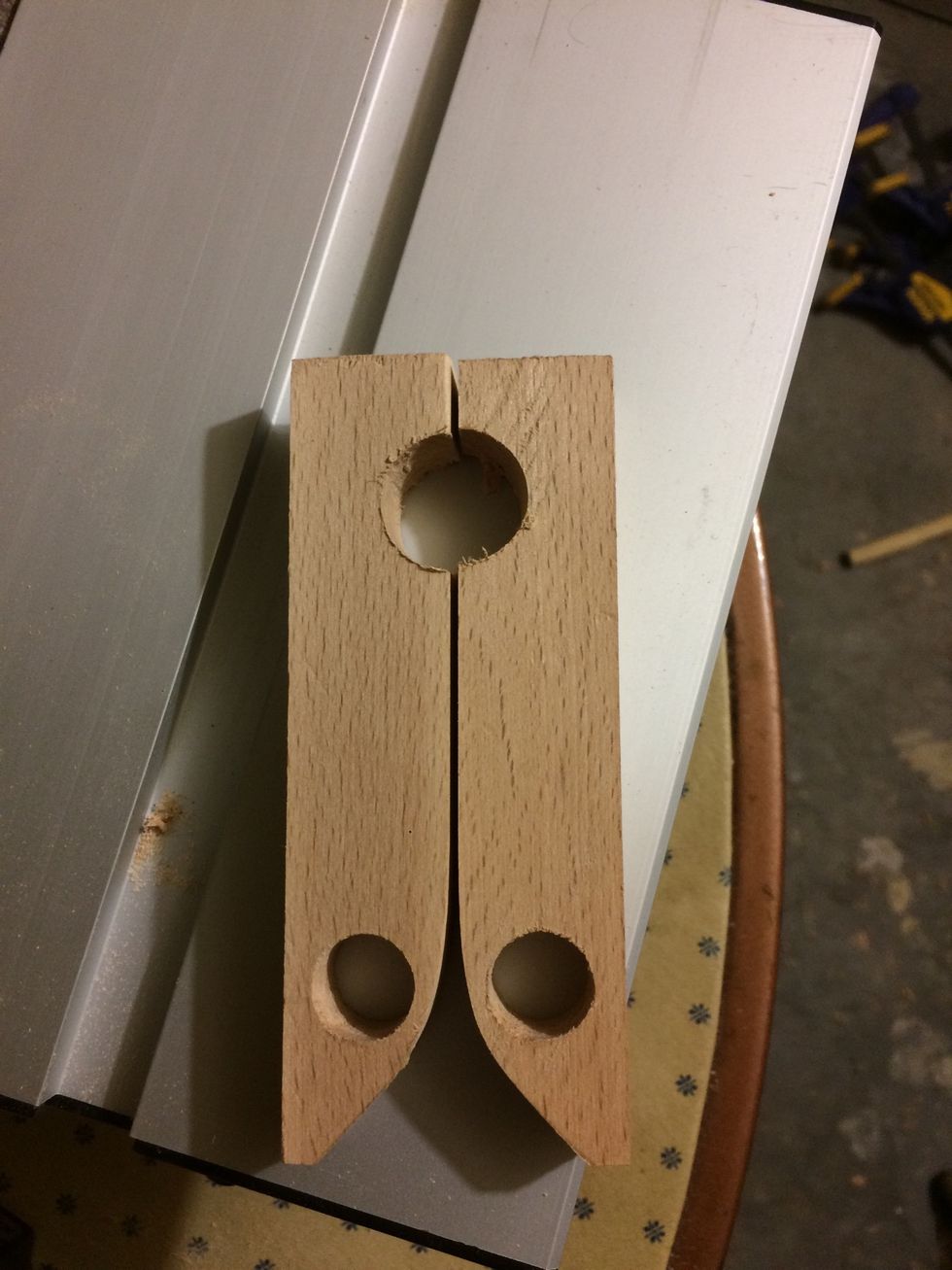 I wanted some type of hook on the piece of wood. So I put two hooks together and used a 7/8" spade bit to make this shape.