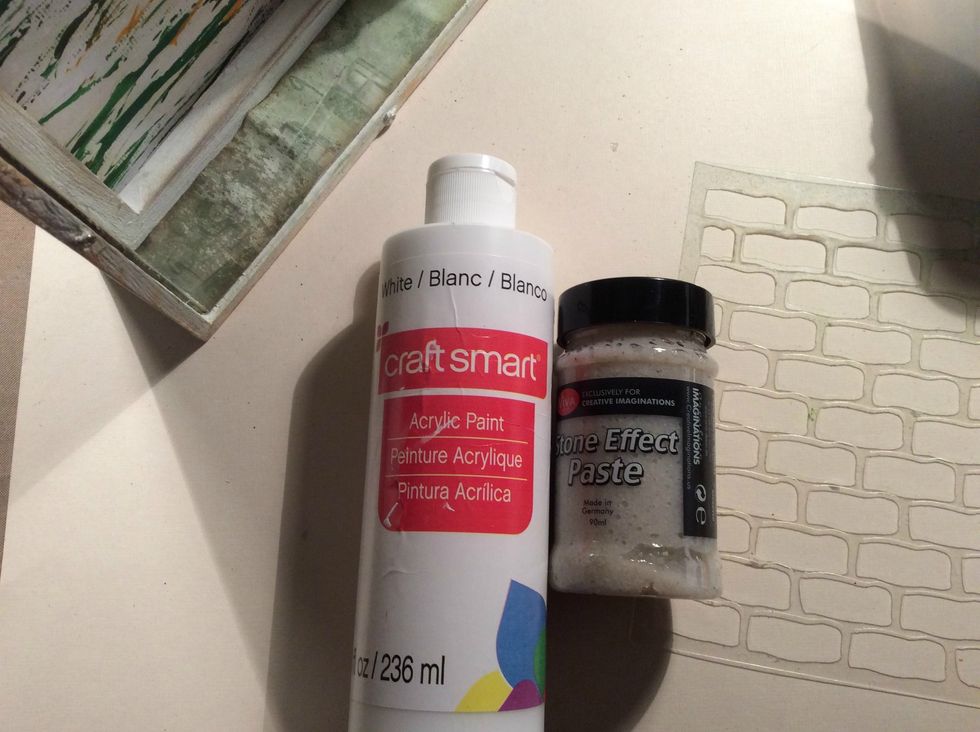 I wanted to add a bit of texture to the outside of the frame. I mixed Stone Effect Paste by DecoArt with white paint and using my brick stencil I applied randomly to outside of frame.