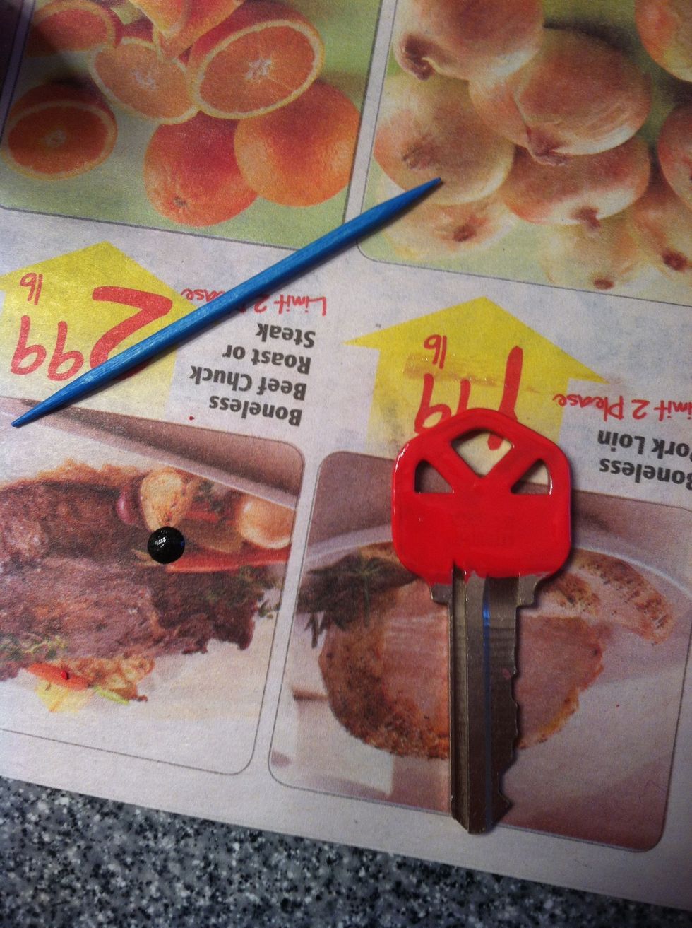 I wanted to add a design to this one. Using a toothpick and some black mail polish I drew a heart because this one's my house key! I wanted to do leopard print but my keys have too many holes.