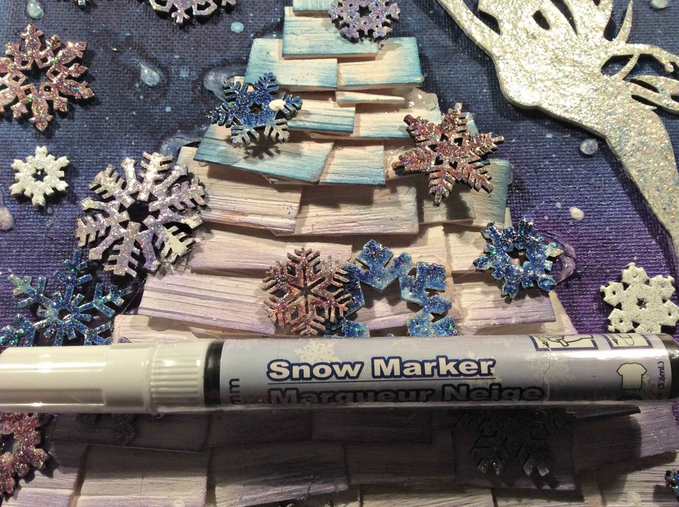 I wanted to add a touch of snow to the tree, I used this Snow Marker but you can also use SnowTex, or even modeling paste applied clumpy will do the trick.