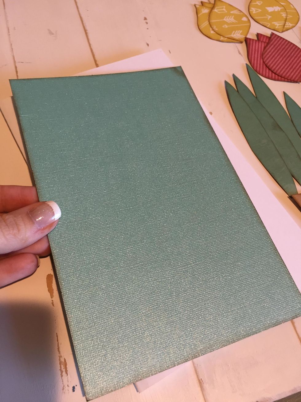 I wanted to add some color to the top of my card, so I cut a 8.25x5.25 piece of paper out of some color cardstock to layer on top.