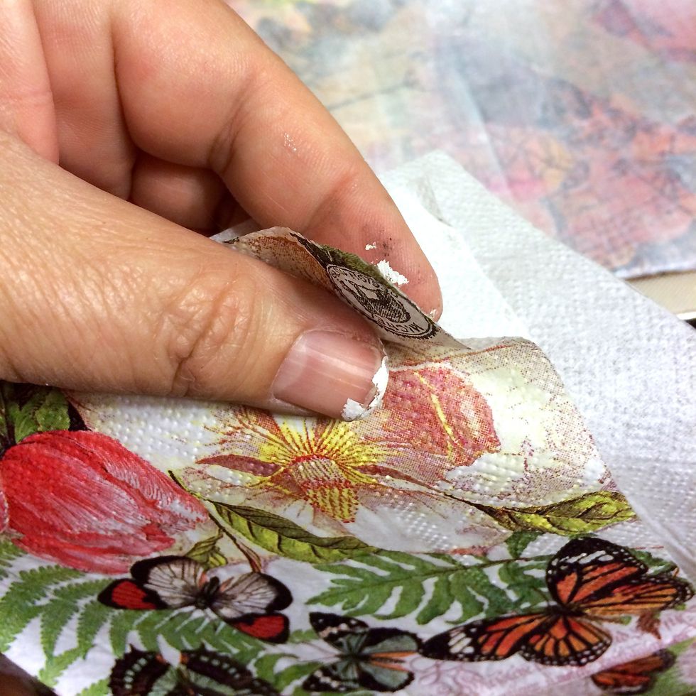 I wanted to collage this pretty napkin onto the canvas, so I had to separate the layers, first. This napkin had 3 layers. I only used the very top one for this project.