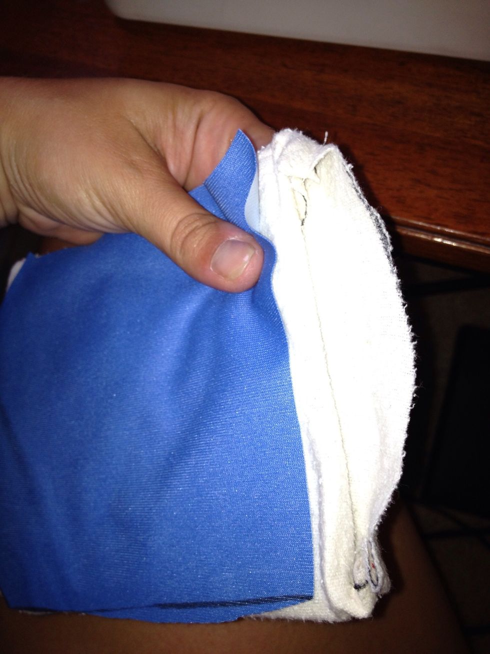 I wanted to hide the multi colored inner layers on this pair, so I trimmed the inside layers and folded the white layer over and onto the PUL.