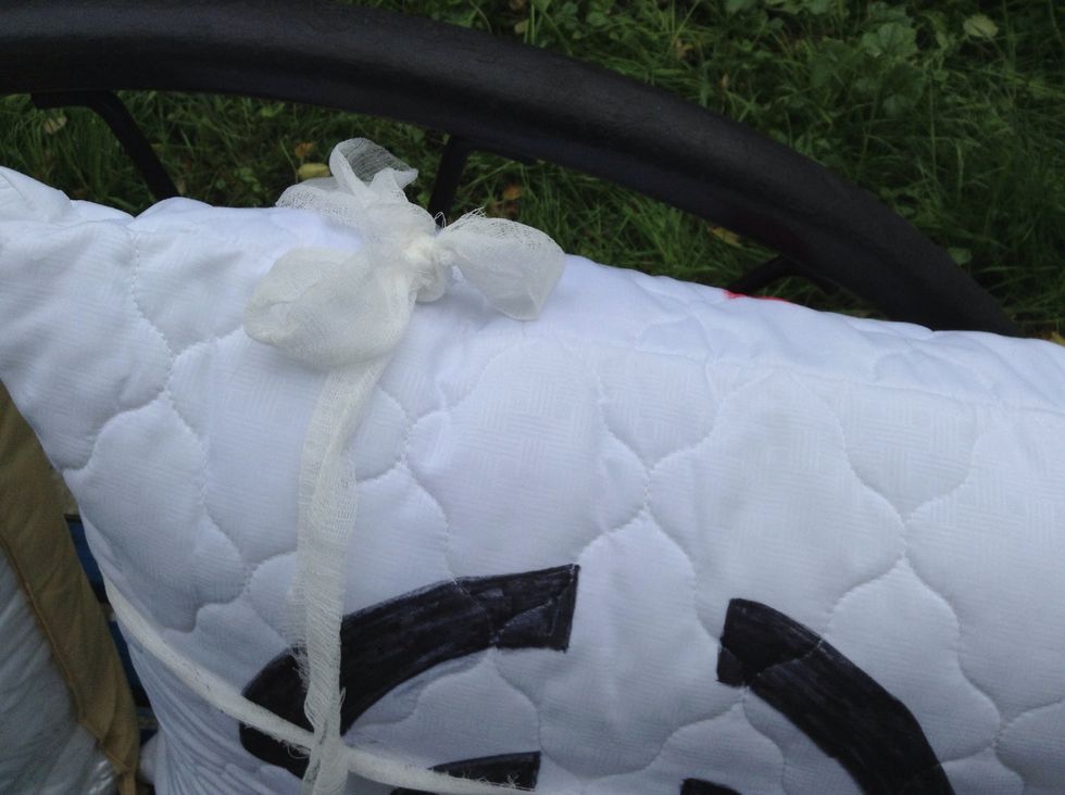 I wanted to present this pillow as a gift to my friend. I left the bandage on the pillow as a ribbon and made the bow. Yet the bandage may be useful after fighting ;)