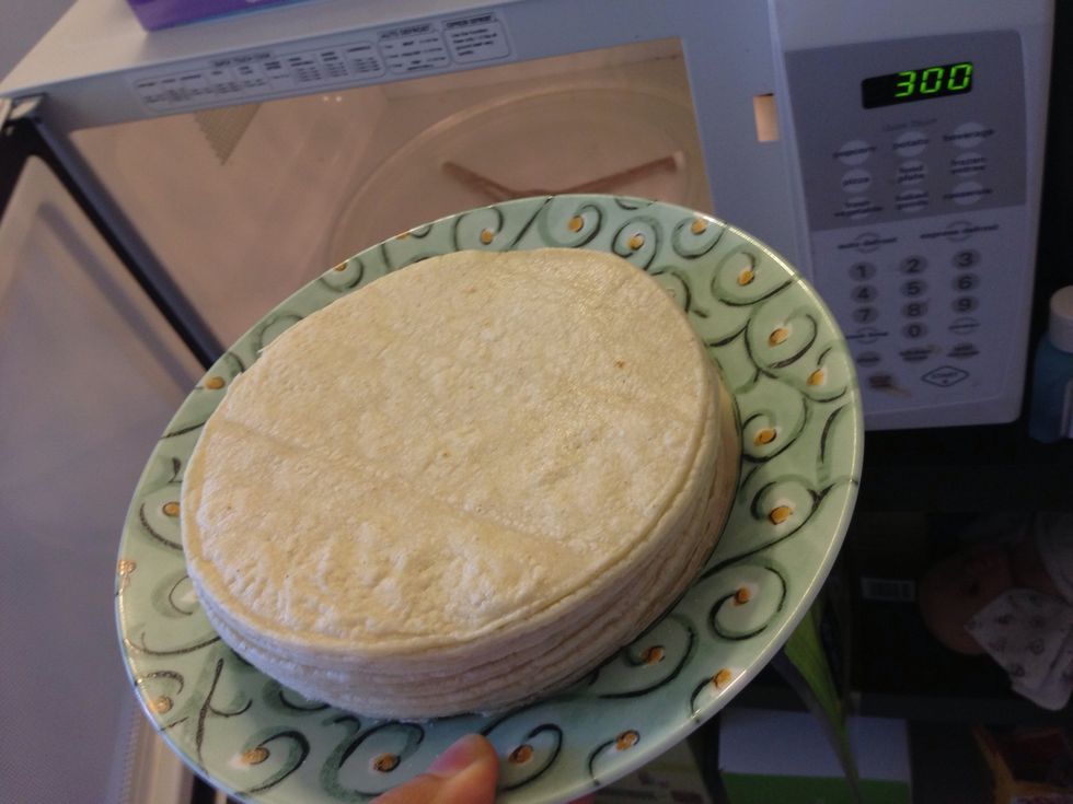 I warm up the tortillas (about 18) in the microwave for 3 minutes. It's quicker than on a griddle and all you really want is to soften them up so they don't break as you roll them.