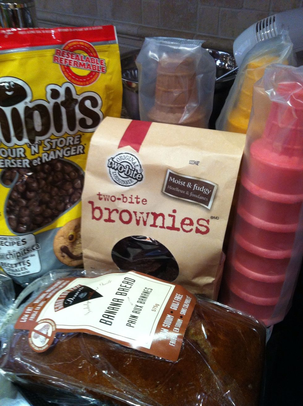 I was going to bake the mini cupcakes separately but I've ran out of flour. A quick look in the unhealthy snacks closet and I discovered my older son's stash of brownies.