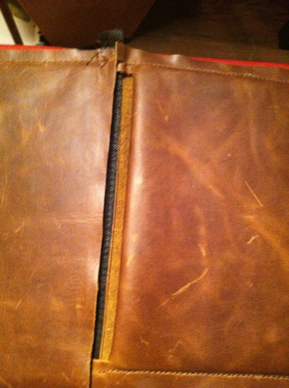 I was thinking I could add some nice black felt or leather to cover the inside spine.