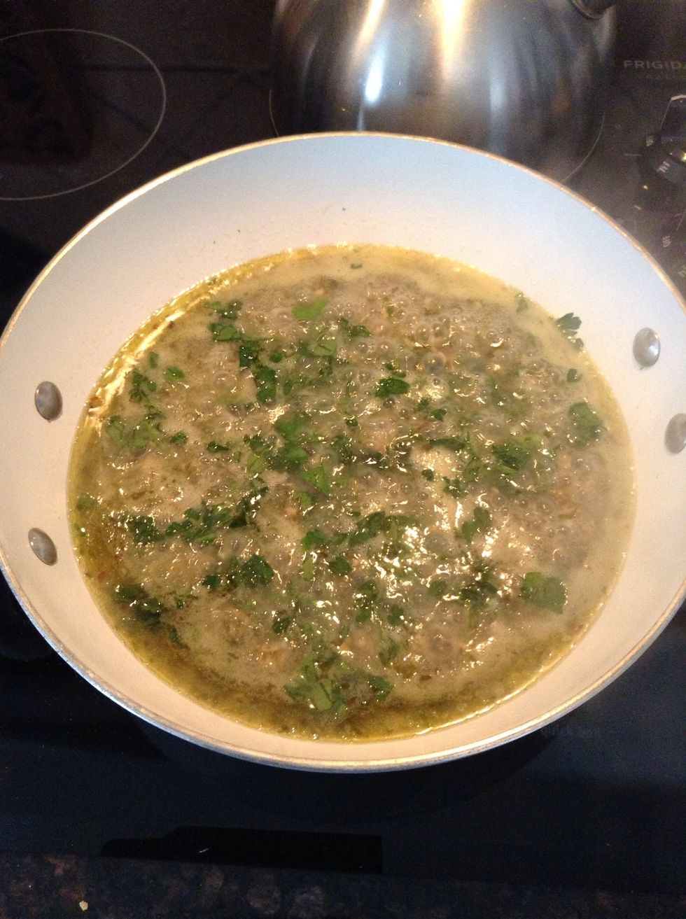 I went ahead & added the fresh chopped parsley, as seen here. Save a little for garnish (optional). Bring to simmer on medium heat.