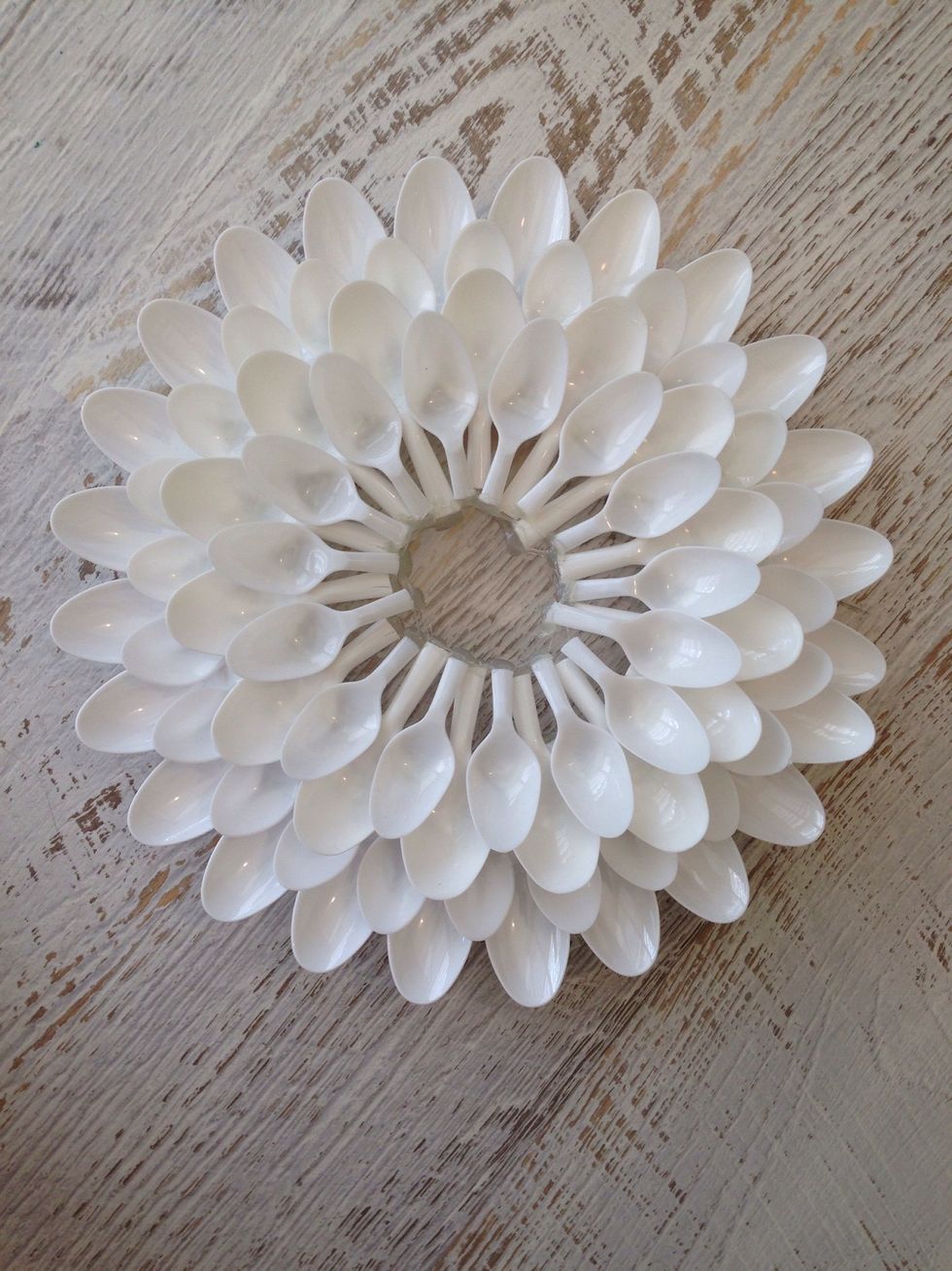 I went back and added small sized spoons in between the first two layers, adding more density and making the flower fuller