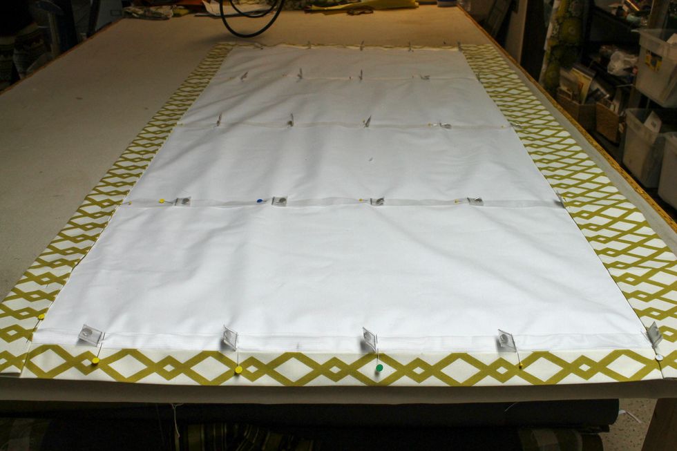 I went back and changed the direction of the pins so that I could sew over them. Its double the work but it's easier to pin them side to side first then go back and change the pins. Notice 2nd row.