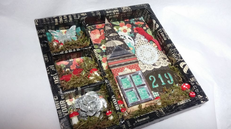 I went in and added more moss to cover some of the extra glue and ensure a deeply layerd look.