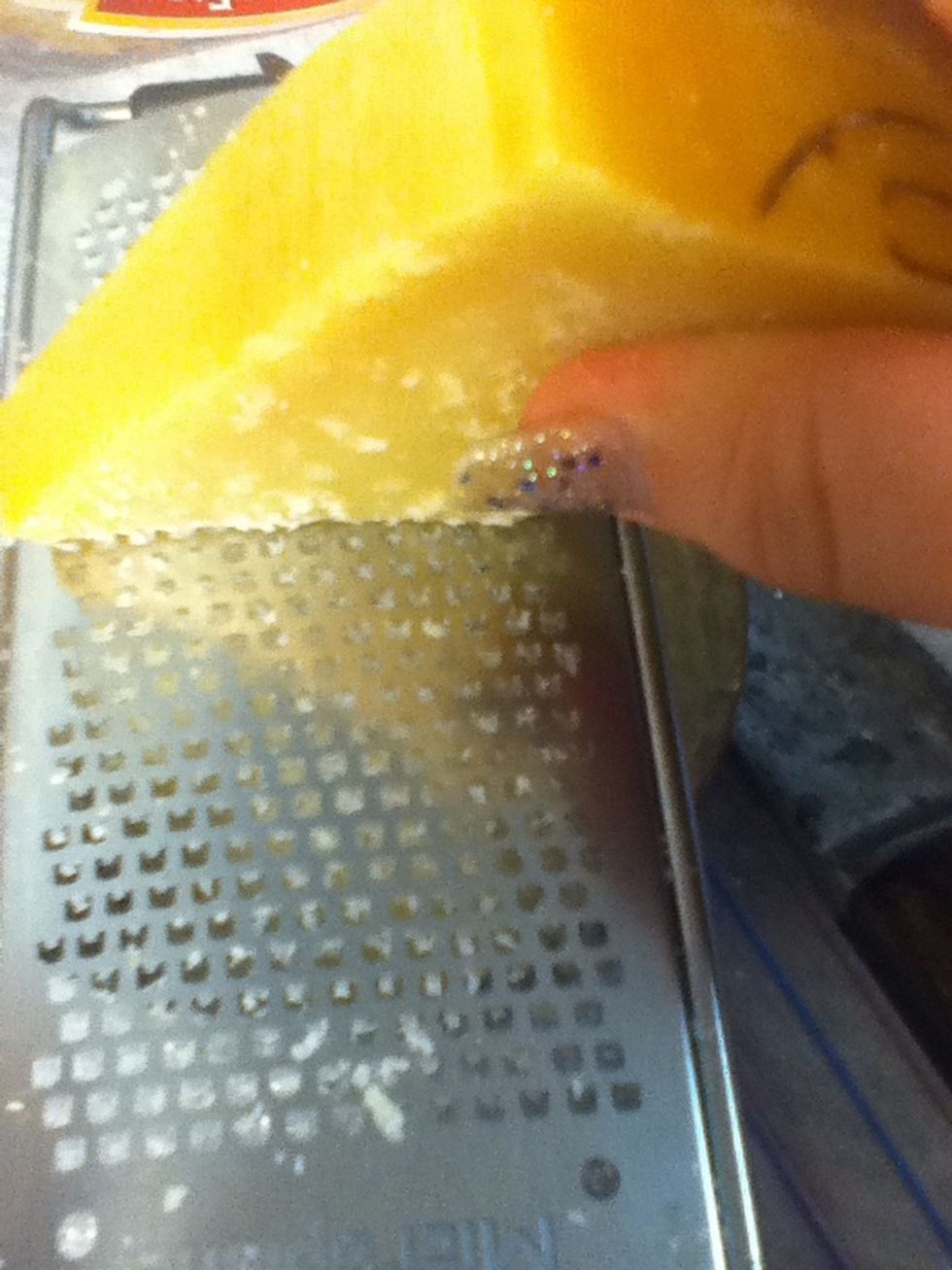 I would start by grating the Parmesan cheese.. It's a pain in ze azz..