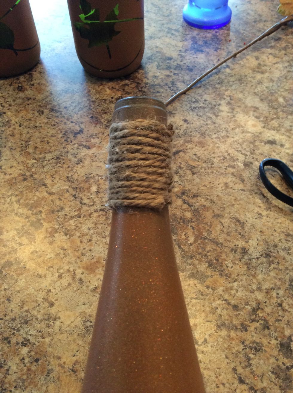 I wrap the tops of my bottles with twine