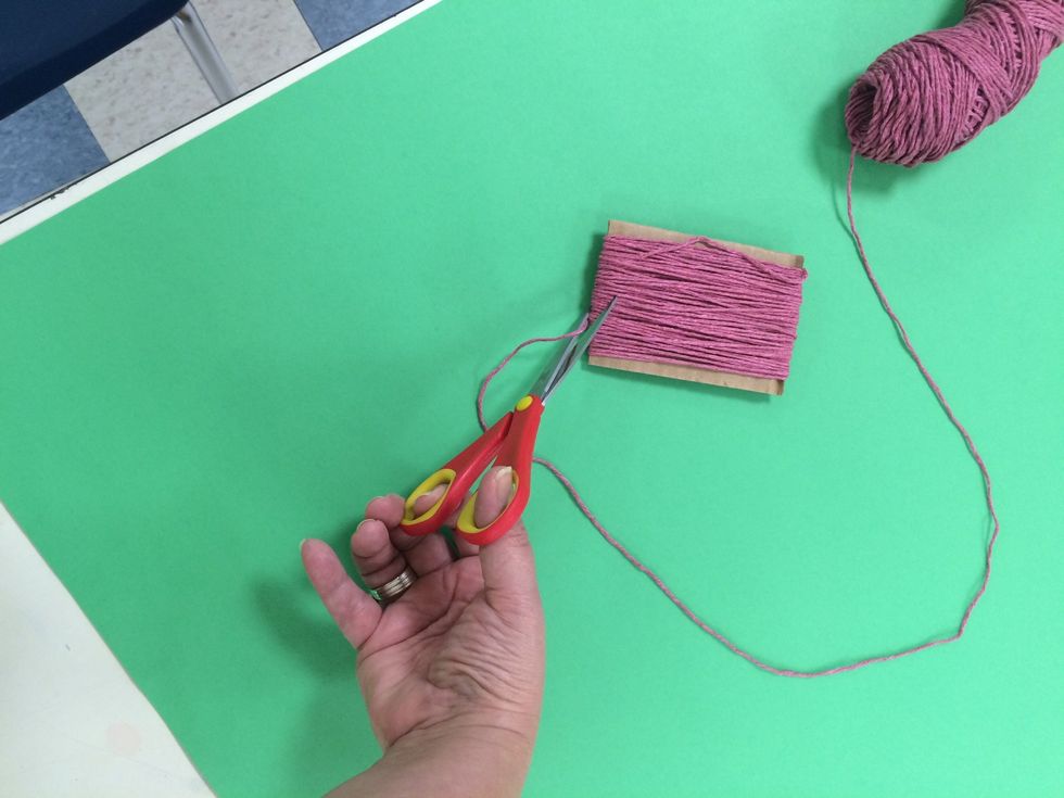 I wrap the yarn around approximately 40-50 times.