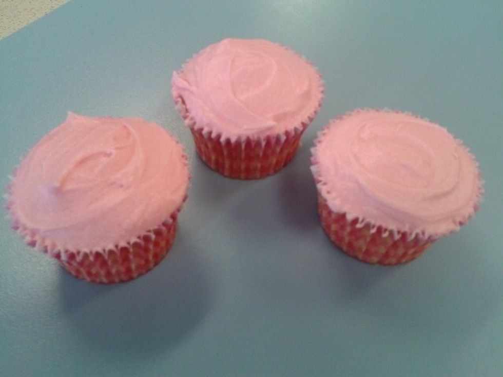 Ice all your cupcakes with the pink icing you made.