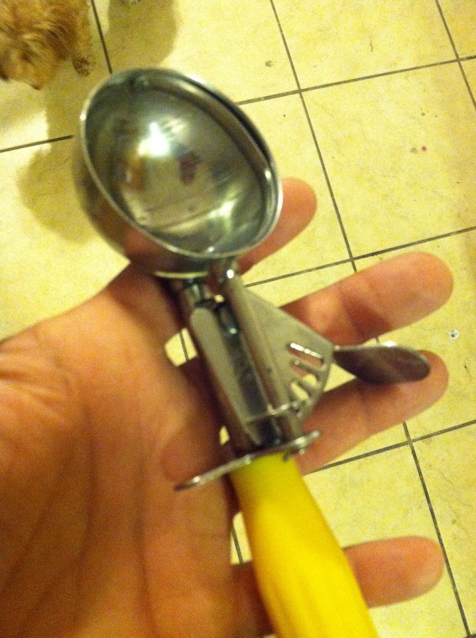 Ice cream scooper fill up only half way with pancake mix