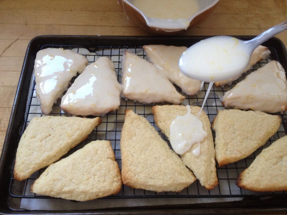 Ice scones once completely cooled using a tablespoon. The dipping method works just as well. Allow the icing to harden before serving, about an hours time.