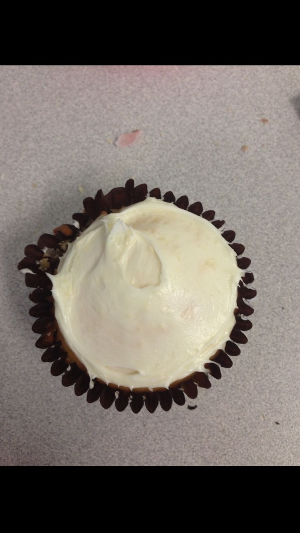 Ice the cupcakes with the Betty Crocker icing until smooth and as even as possible.