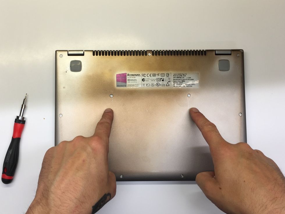 Identify the two T5 Torx Screws holding the keyboard in place