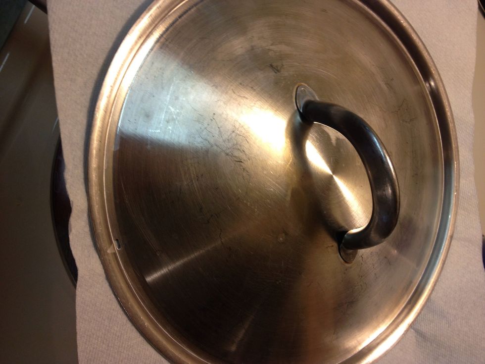 If at any time you smell burnt rice, remove pan from heat and add a little oil in the holes before continuing on a lower temp setting. After 6 min, turn to low, cover with a paper towel and put on lid